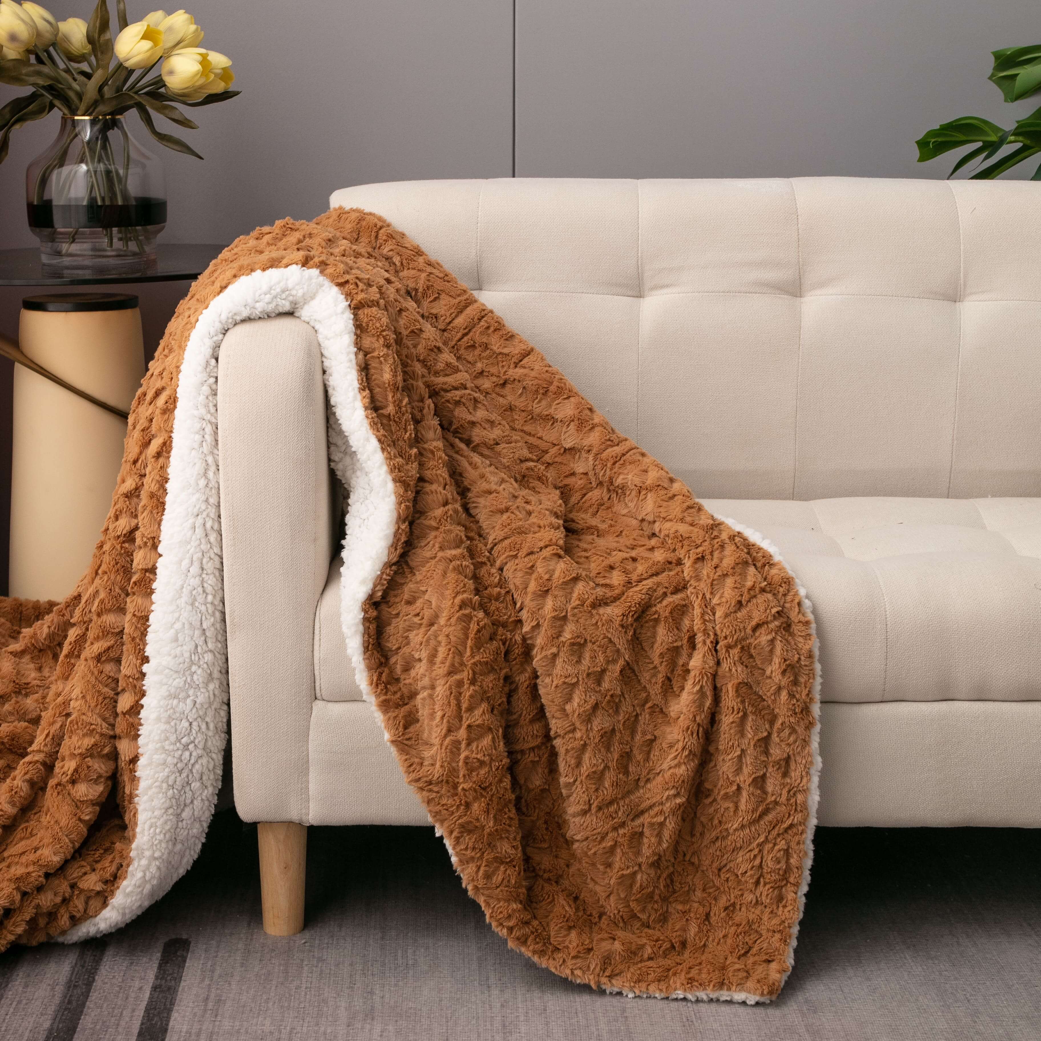 cozy light cognac camel brown faux fur sherpa throw blanket on casual living room couch. click to view all blankets. Elegant Luxury decorative couch sofa bed bedroom super soft cozy cuddly blanket
