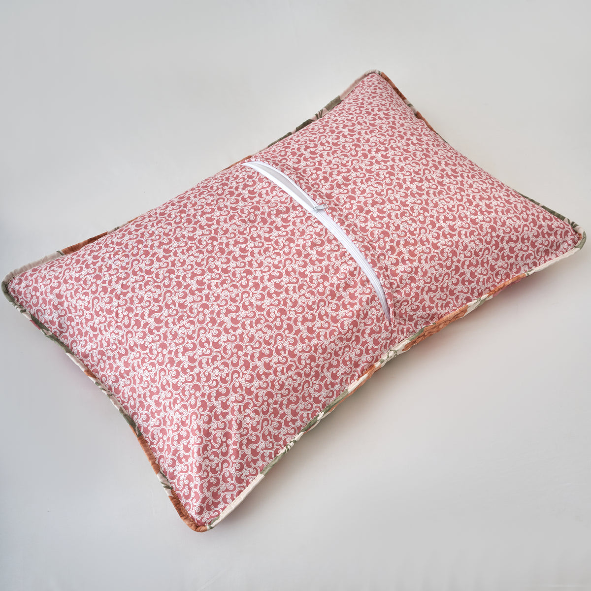 Back of the rose scroll reversible pillow sham showing the hidden zipper closure