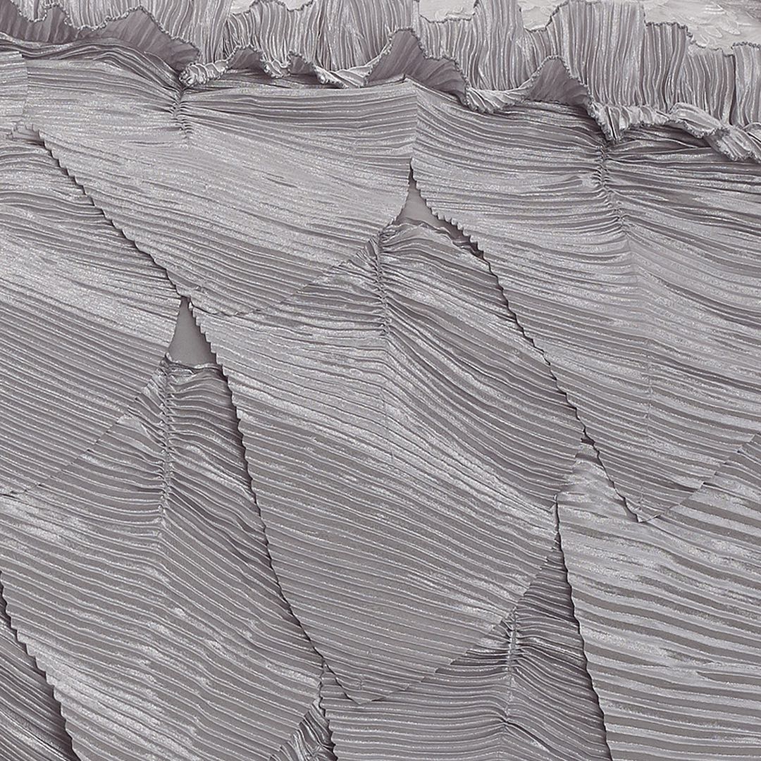 Textured gray surface with wavy patterns