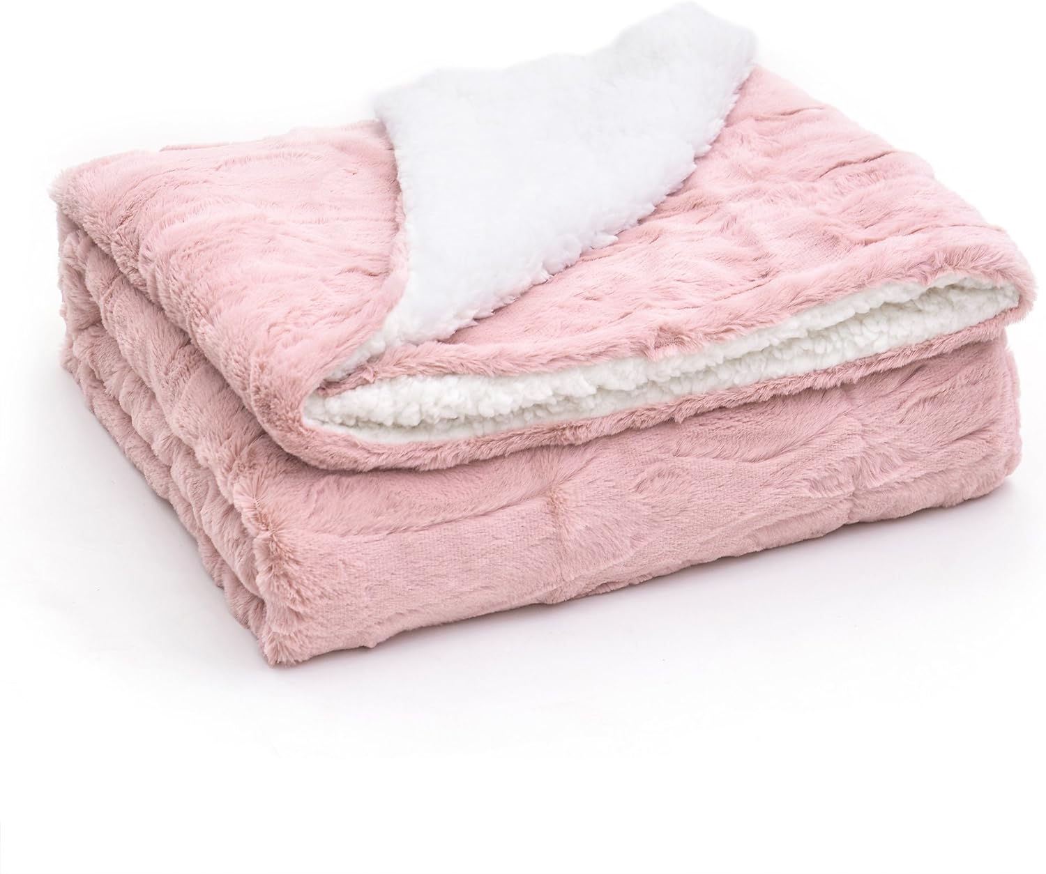 A soft rose pink faux fur blanket adds a touch of comfort