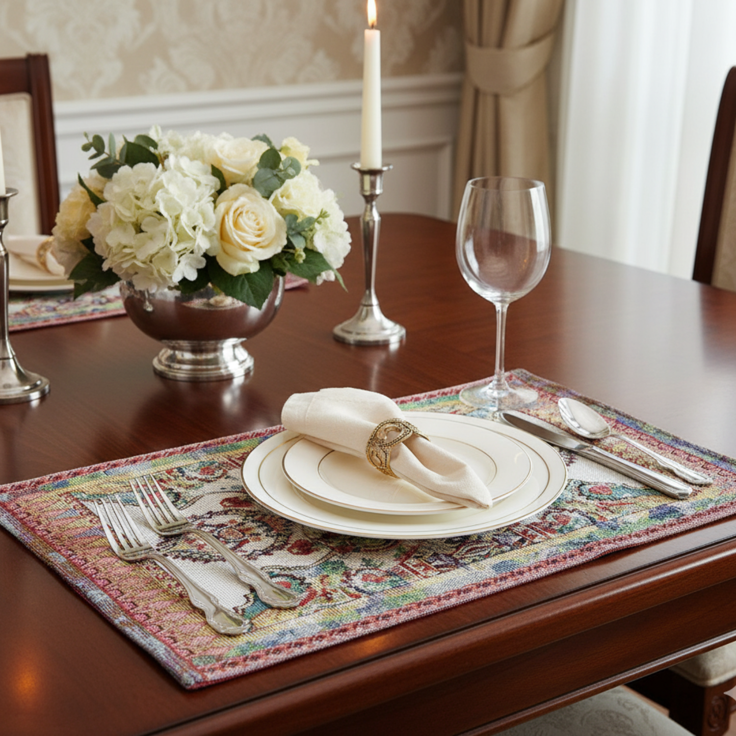 Elegant High end Victorian Dining table set with floral arrangement, candle, and cutlery on a decorative placemat.