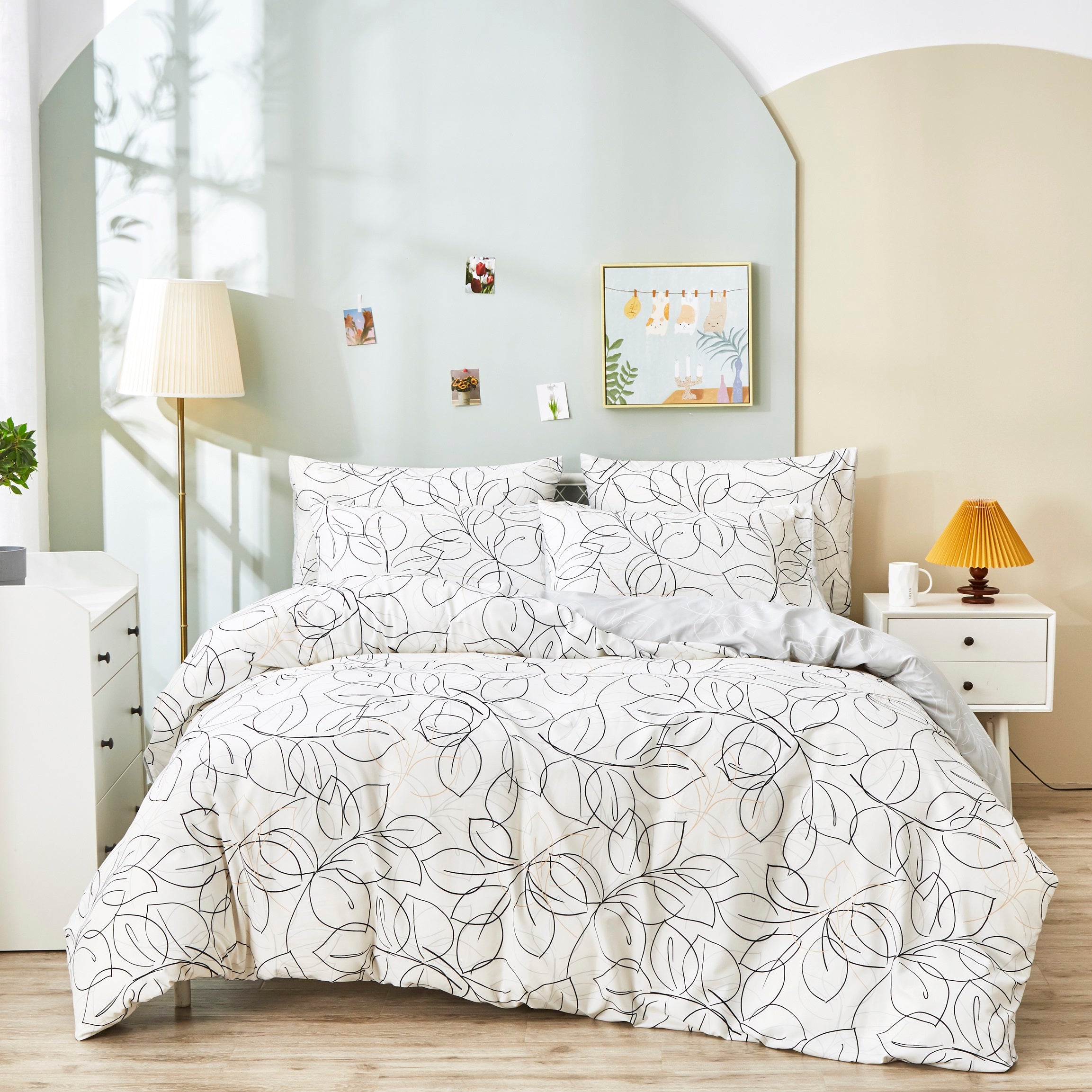 modern white leaf line art duvet cover on bed. click to view all duvet covers.