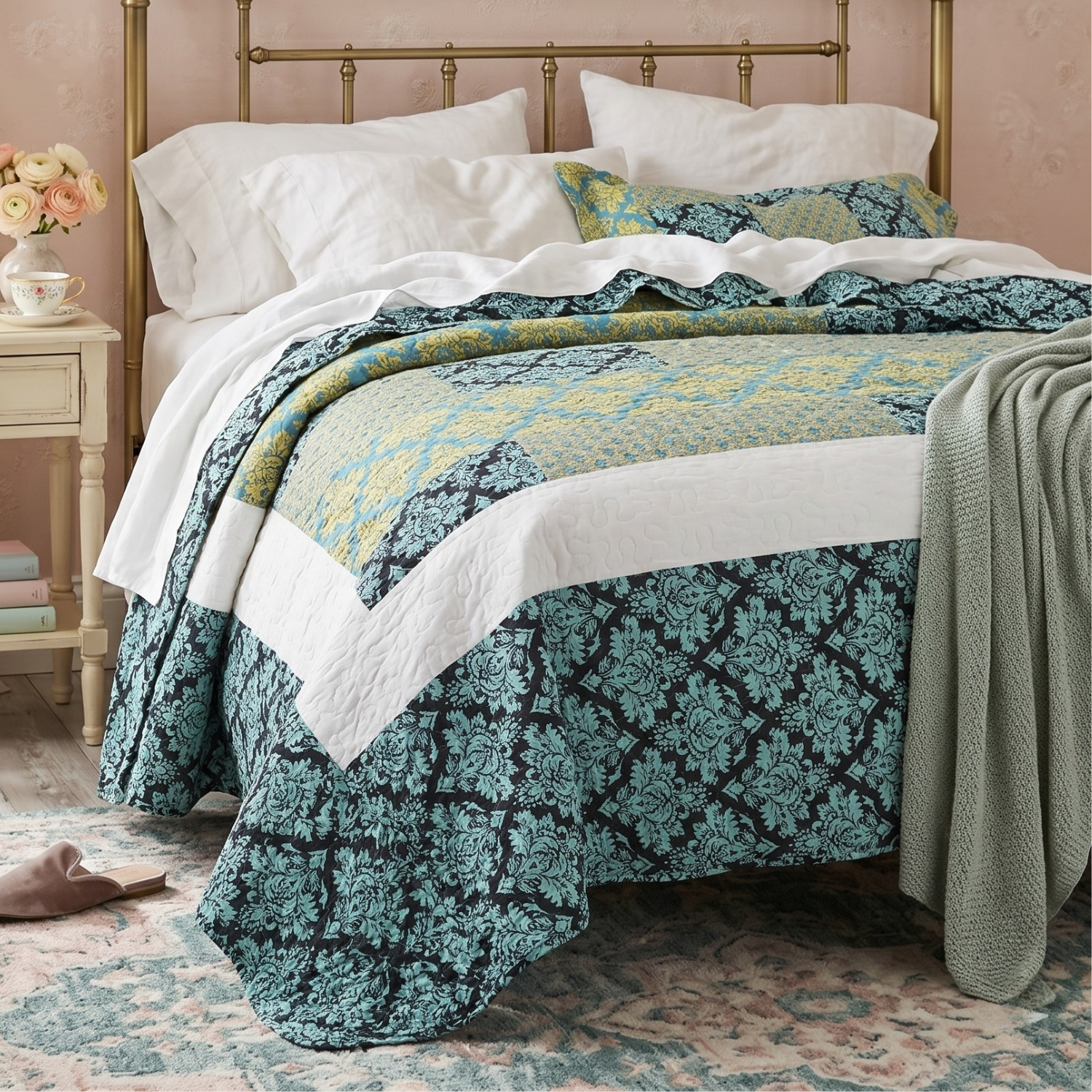 Tache Home Fashion cottagecore teal, turquoise, and yellow patchwork quilt set featuring ornate baroque damask patterns, styled on a gold metal frame bed with a green throw blanket.